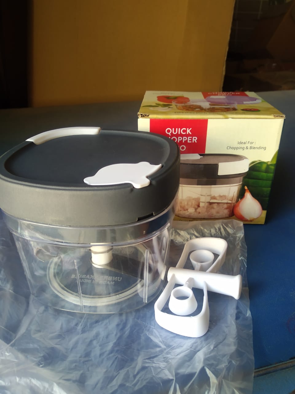 Multi-functional chopper and slicer with a clear bowl for visibility Multi-functional chopper and slicer with a clear bowl for visibility